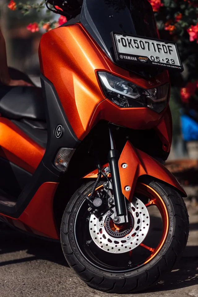 Orange Candy Yamaha NMAX 155cc scooter rental in Bali, photo 3