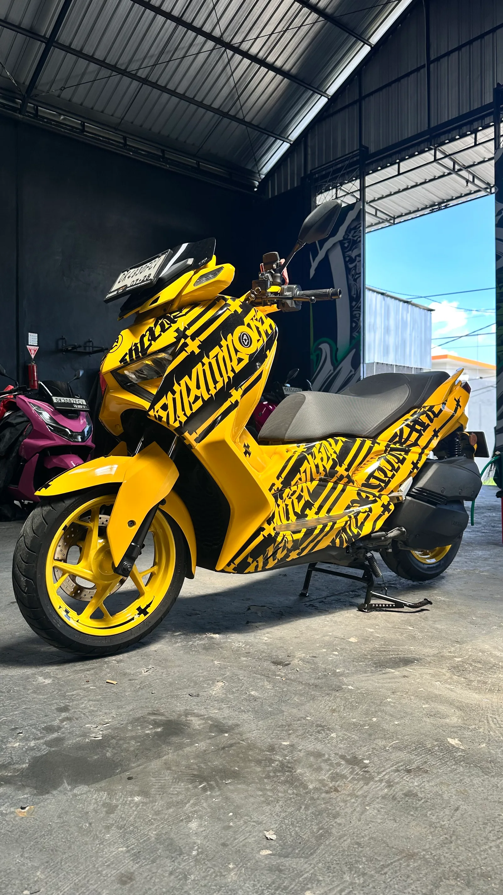 Yellow Yamaha XMAX Limited 250cc scooter rental in Bali